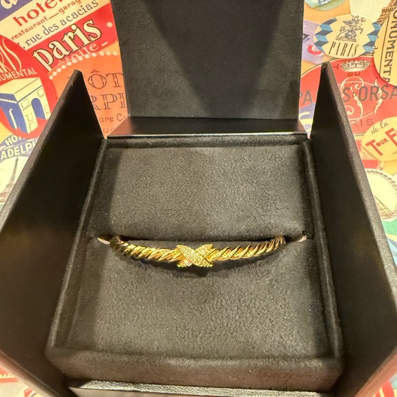 18m Gold Plated Twisted Bracelet with Simulated Diamond X Accents .